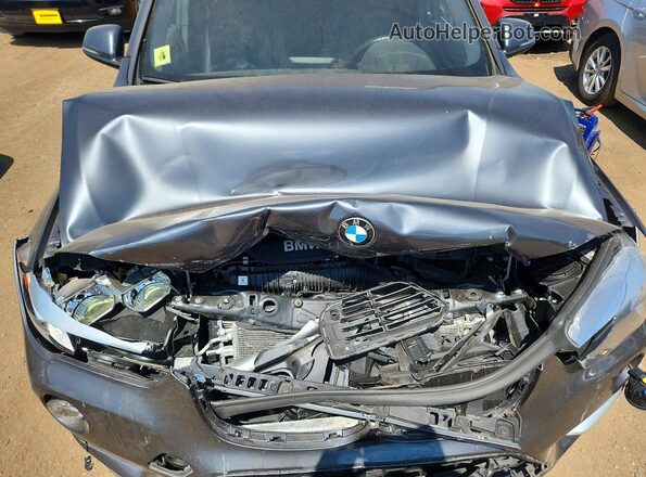 WBXHT3C54K5L35502 2019 BMW X1 Gray Սալոնի հետևի տեսք