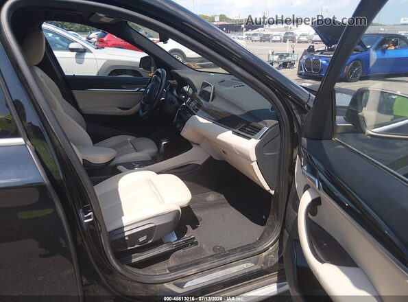 WBXHT3C54K5L89172 2019 BMW X1 Black Widok wnętrza z przodu