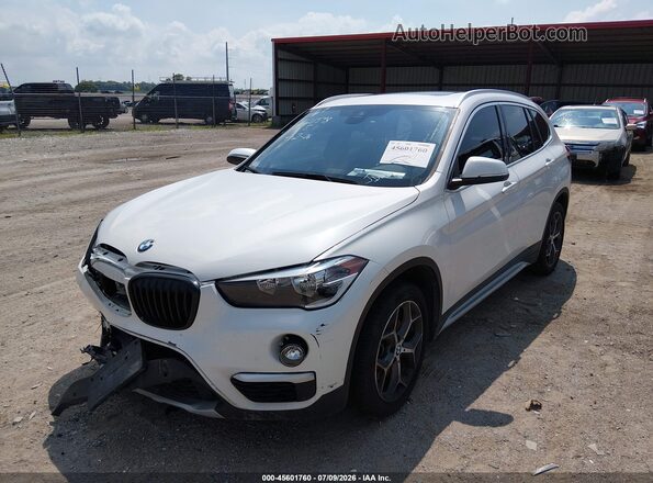 WBXHT3C56K5L38501 2019 BMW X1 White Առջևի ձախ երեք քառորդ տեսարան