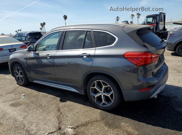 WBXHT3C59K5L89166 2019 BMW X1 Gray Trasero izquierdo