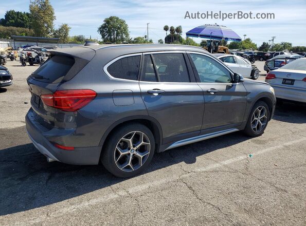 WBXHT3C59K5L89166 2019 BMW X1 Gray Trasero derecho