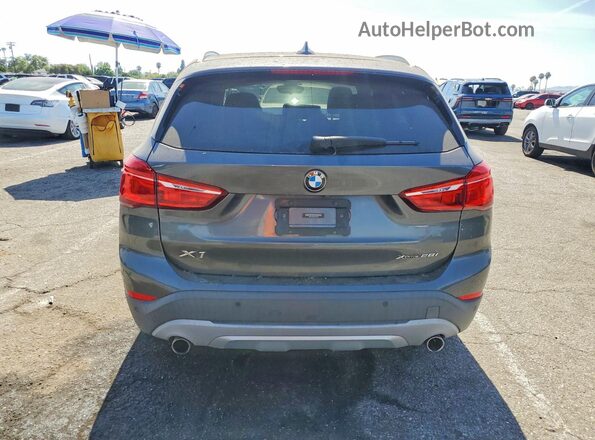 WBXHT3C59K5L89166 2019 BMW X1 Gray Vista trasera