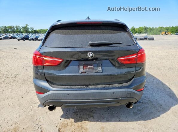 WBXHT3Z30H4A52098 2017 BMW X1 Black უკანა ხედი