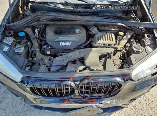 WBXHT3Z30H4A52098 2017 BMW X1 Black ძრავის განყოფილების ხედი