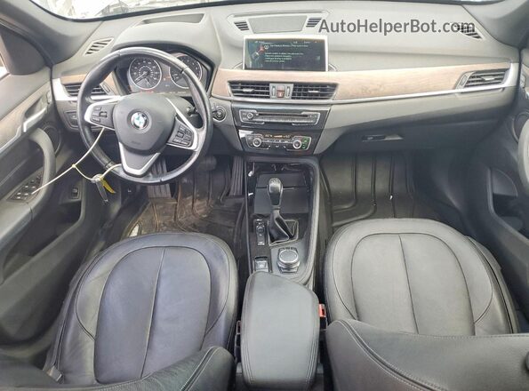 WBXHT3Z32G4A51761 2016 BMW X1 Gray Առջևի վահանակի տեսք