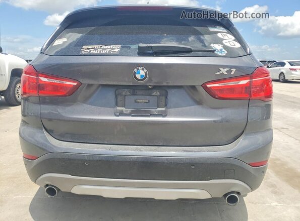 WBXHT3Z32G4A51761 2016 BMW X1 Gray Հետևի տեսք