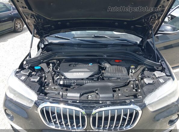 WBXHT3Z33H4A53570 2017 BMW X1 Black Հետևի տեսք