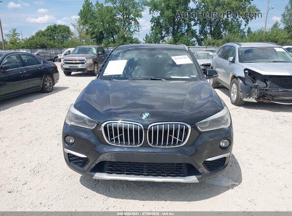 WBXHT3Z33H4A53570 2017 BMW X1 Black Սալոնի հետևի տեսք