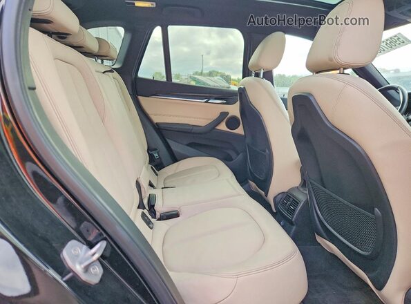 WBXHT3Z35G4A48403 2016 BMW X1 Black უკანა სავარძლების ხედი