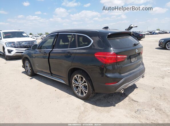 WBXHT3Z35G4A50734 2016 BMW X1 Black Rear left