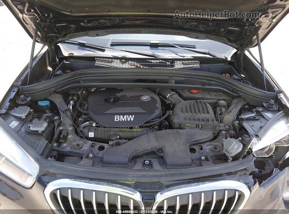 WBXHT3Z35G4A50734 2016 BMW X1 Black Rear view