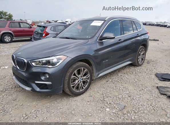 WBXHT3Z35H4A52212 2017 BMW X1 Gray Передня ліва чверть