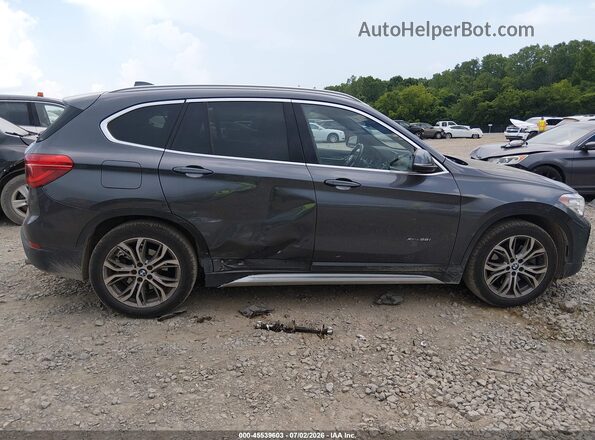 WBXHT3Z35H4A52212 2017 BMW X1 Gray Вид спереду