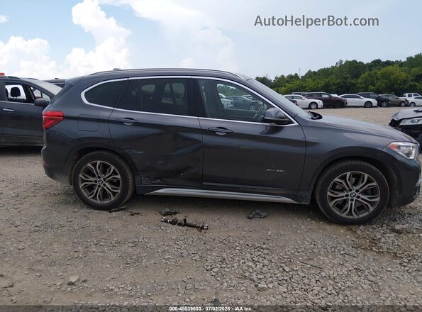 WBXHT3Z35H4A52212 2017 BMW X1 Gray Вид задньої частини салону