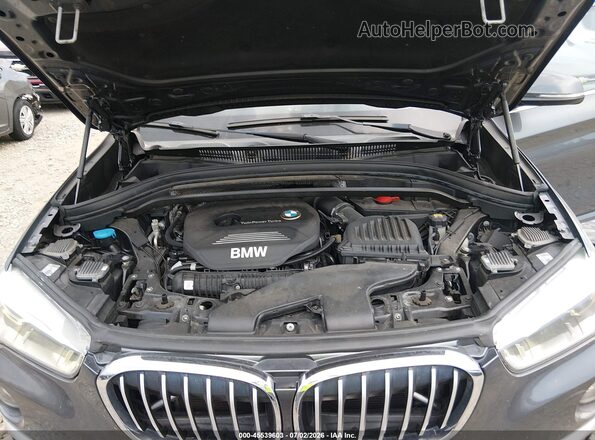 WBXHT3Z35H4A52212 2017 BMW X1 Gray Вид ззаду