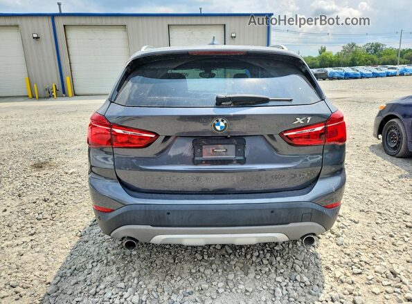 WBXHT3Z36J4A65959 2018 BMW X1 Gray Widok z tyłu