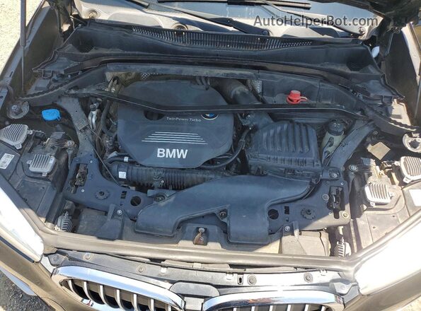 WBXHT3Z37G4A50895 2016 BMW X1 Black Vista interior trasera