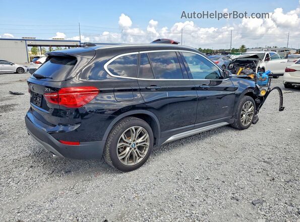 WBXHT3Z39H4A56277 2017 BMW X1 Черный Задняя правая четверть