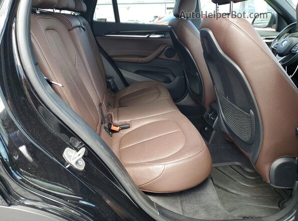 WBXHT3Z39H4A56277 2017 BMW X1 Черный Вид задней части салона