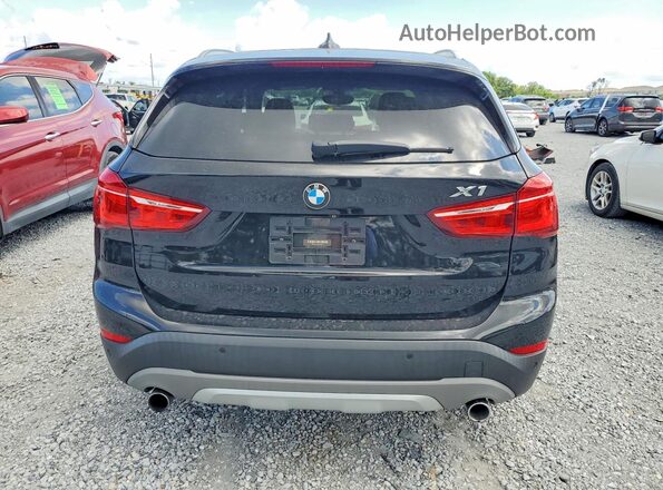 WBXHT3Z39H4A56277 2017 BMW X1 Черный Вид сзади