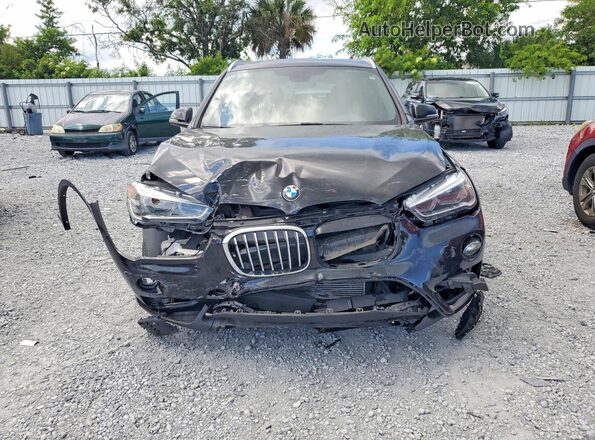 WBXHT3Z39H4A56277 2017 BMW X1 Черный Вид спереди