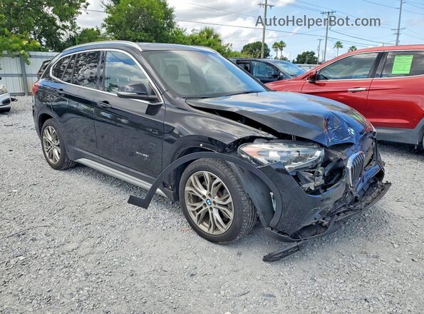WBXHT3Z39H4A56277 2017 BMW X1 Черный Передняя правая четверть