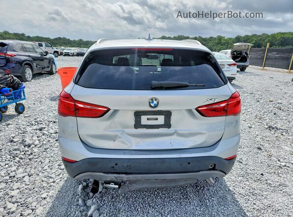 WBXHT3Z39H4A57946 2017 BMW X1 Silver Вид ззаду