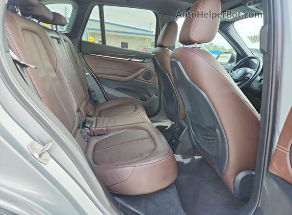 WBXHT3Z39H4A57946 2017 BMW X1 Silver Вид задніх сидінь