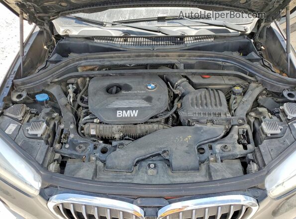 WBXHT3Z3XH4A55073 2017 BMW X1 Black Սալոնի հետևի տեսք