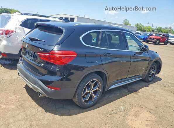 WBXHU7C30H5H36284 2017 BMW X1 Black Trasero derecho