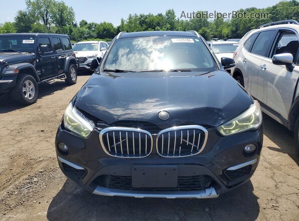 WBXHU7C30H5H36284 2017 BMW X1 Black Vista frontal
