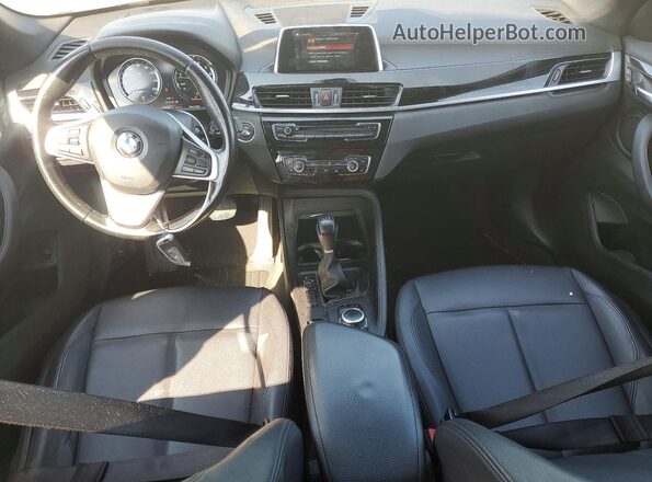 WBXHU7C31J3F04553 2018 BMW X1 White Առջևի վահանակի տեսք