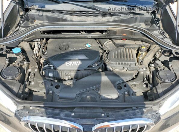 WBXHU7C33H5H37560 2017 BMW X1 Black Вид підкапотного простору