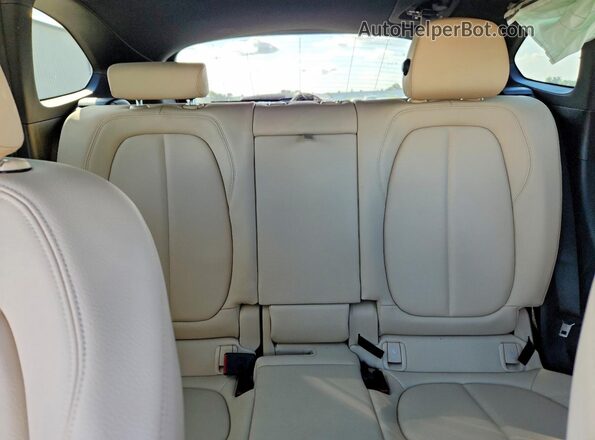 WBXHU7C34H5H37583 2017 BMW X1 Blue Widok tylnych siedzeń