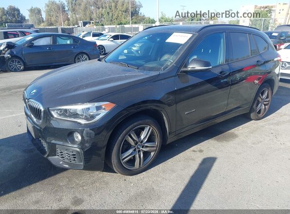 WBXHU7C34HP924808 2017 BMW X1 Black Przód lewy