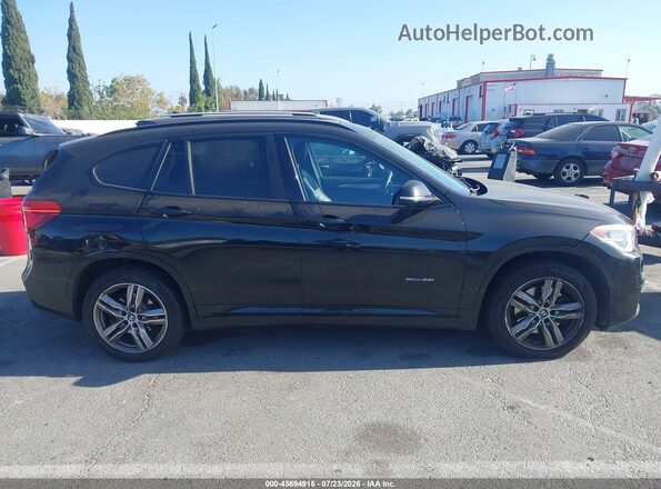 WBXHU7C34HP924808 2017 BMW X1 Black Widok wnętrza z tyłu