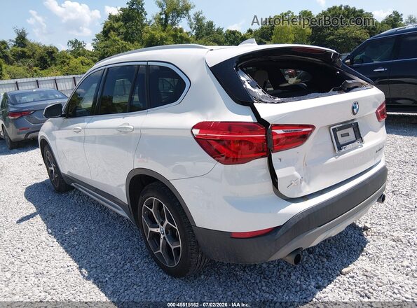 WBXHU7C34J5L08320 2018 BMW X1 White Trasero izquierdo