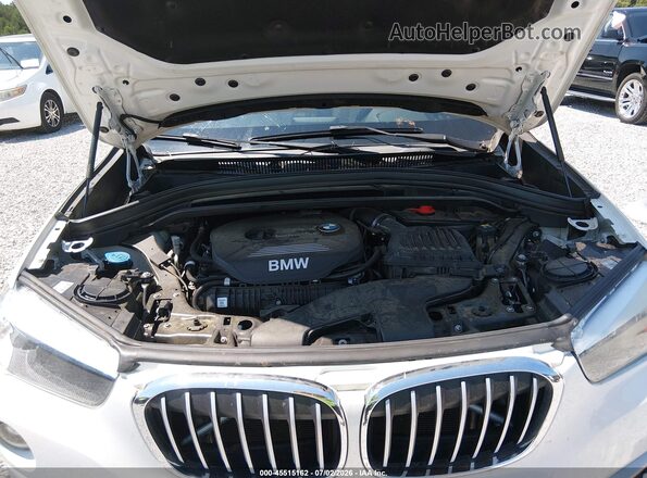 WBXHU7C34J5L08320 2018 BMW X1 White Vista trasera