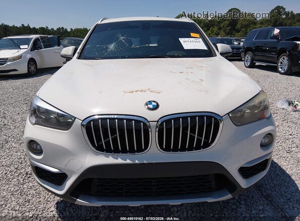 WBXHU7C34J5L08320 2018 BMW X1 White Vista del cuadro de instrumentos