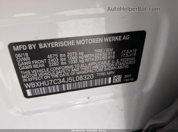 WBXHU7C34J5L08320 2018 BMW X1 White Vista del compartimento del motor