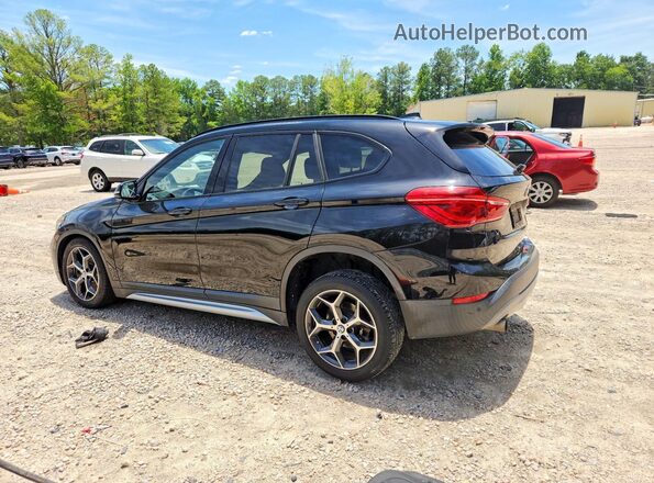 WBXHU7C35H5H37964 2017 BMW X1 Black Rear left