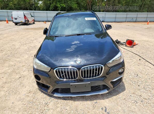 WBXHU7C35H5H37964 2017 BMW X1 Black Front view