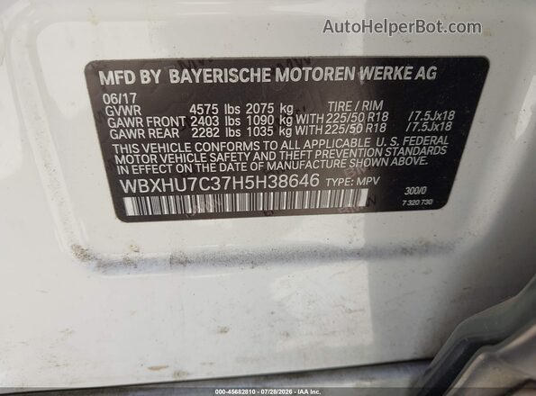WBXHU7C37H5H38646 2017 BMW X1 White Vista del compartimento del motor