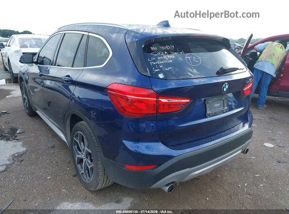 WBXHU7C37J5L05394 2018 BMW X1 Blue Trasero izquierdo