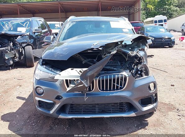 WBXHU7C38J5L06571 2018 BMW X1 Gray Սալոնի հետևի տեսք