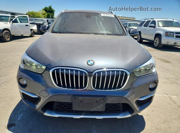 WBXHU7C39J3H43459 2018 BMW X1 Black Вид спереду