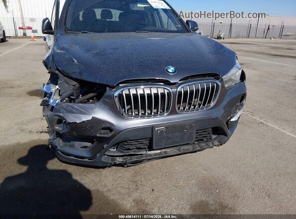 WBXHU7C39J5H43109 2018 BMW X1 Gray Вид спереду