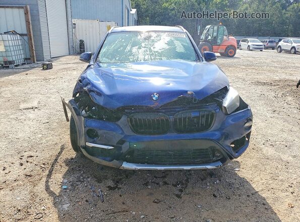 WBXHU7C39J5H45281 2018 BMW X1 Blue Vista frontal