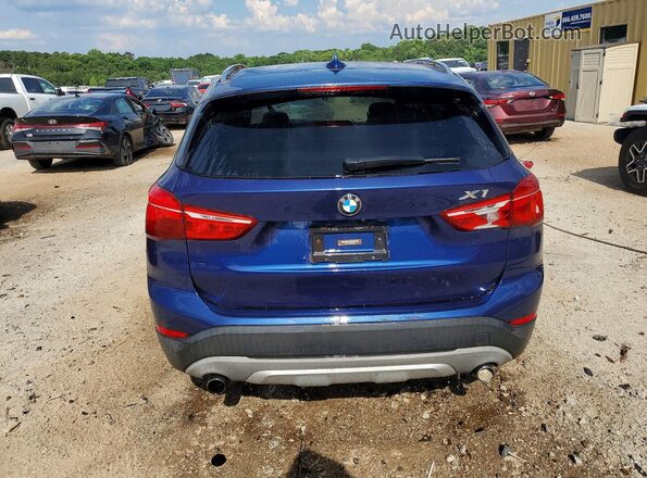WBXHU7C39J5H45281 2018 BMW X1 Blue Vista trasera