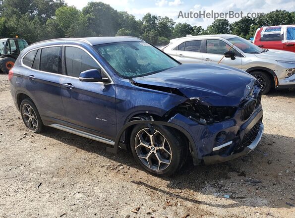 WBXHU7C39J5H45281 2018 BMW X1 Blue 